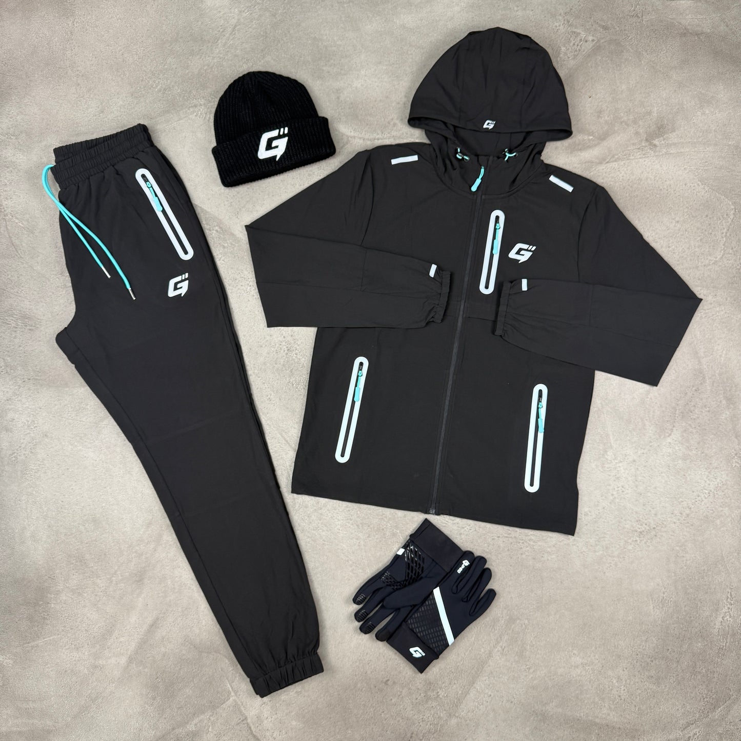 GLYRO REFLECT 1.0 TRACKSUIT - BLACK/AQUA