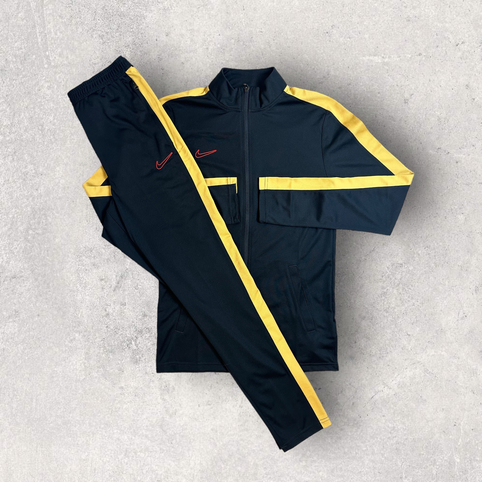 Yellow fashion and black nike tracksuit