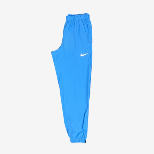NIKE CHALLENGER DRI-FIT WOVEN PANTS - UNIVERSITY BLUE