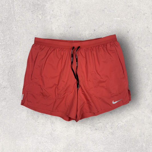 NIKE FLEX STRIDE SHORTS 5 INCH - ADOBE